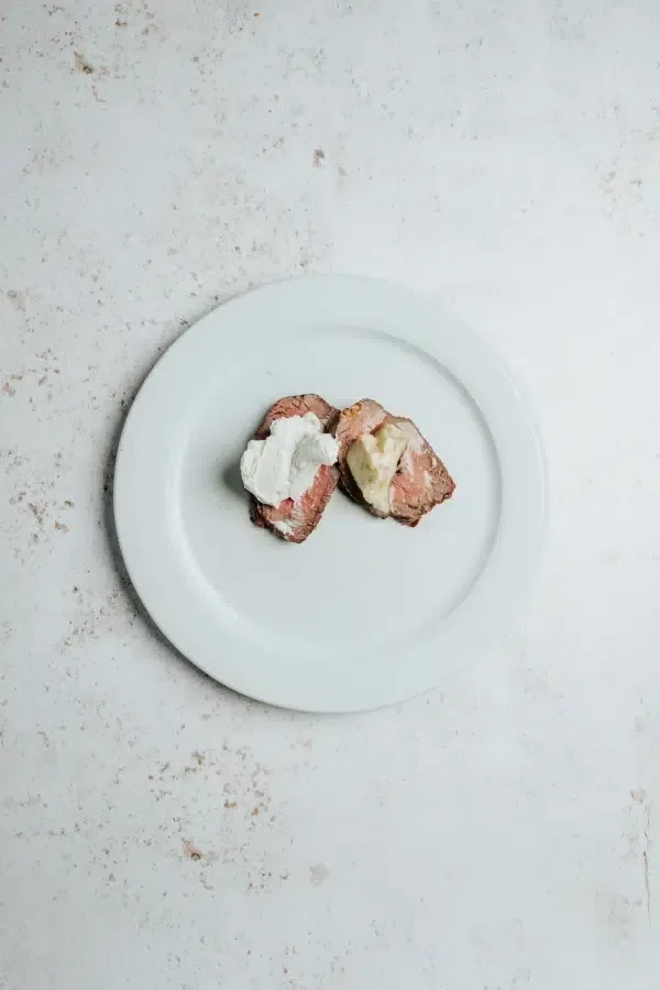 Cuadril con salsa Roquefort y mantequilla “Maître d’Hôtel” · Churrasquería Rodeo Grill
