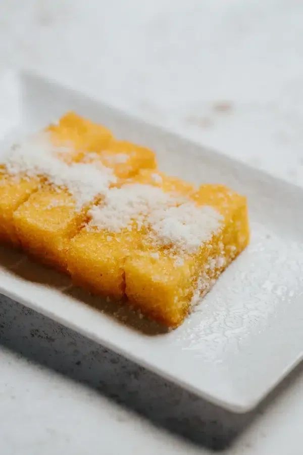 Polenta frita con parmesano · Churrasquería Rodeo Grill